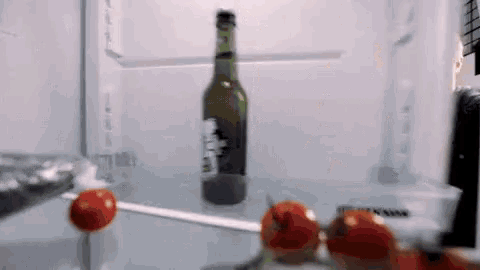 GIF of two men confused by something missing in their refrigerator